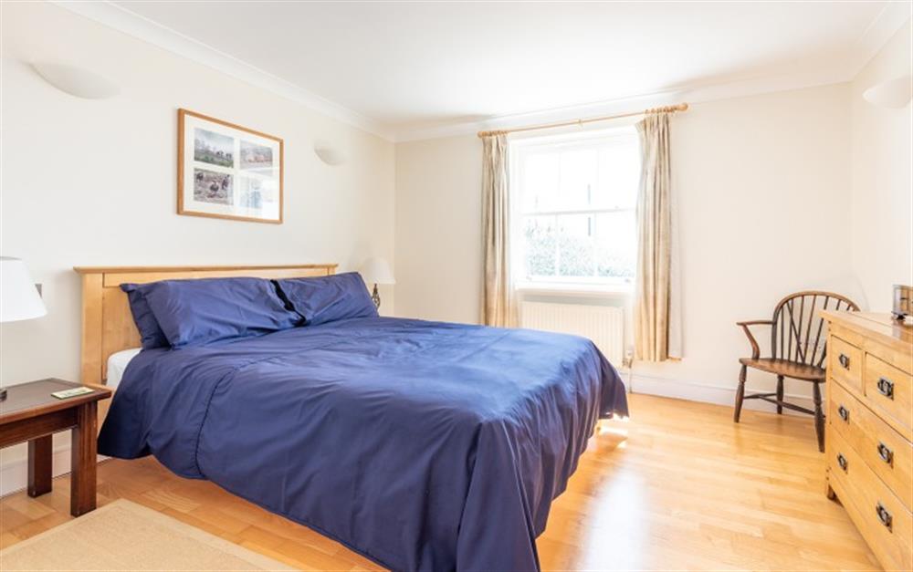 The master bedroom  at 1 Thurlestone Beach Apartments in Thurlestone