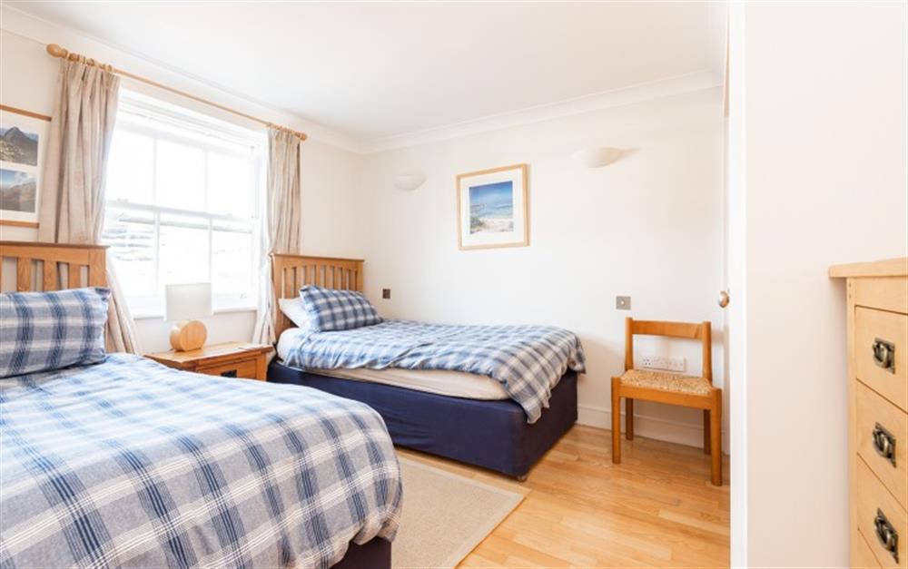 The spacious twin bedroom  at 1 Thurlestone Beach Apartments in Thurlestone