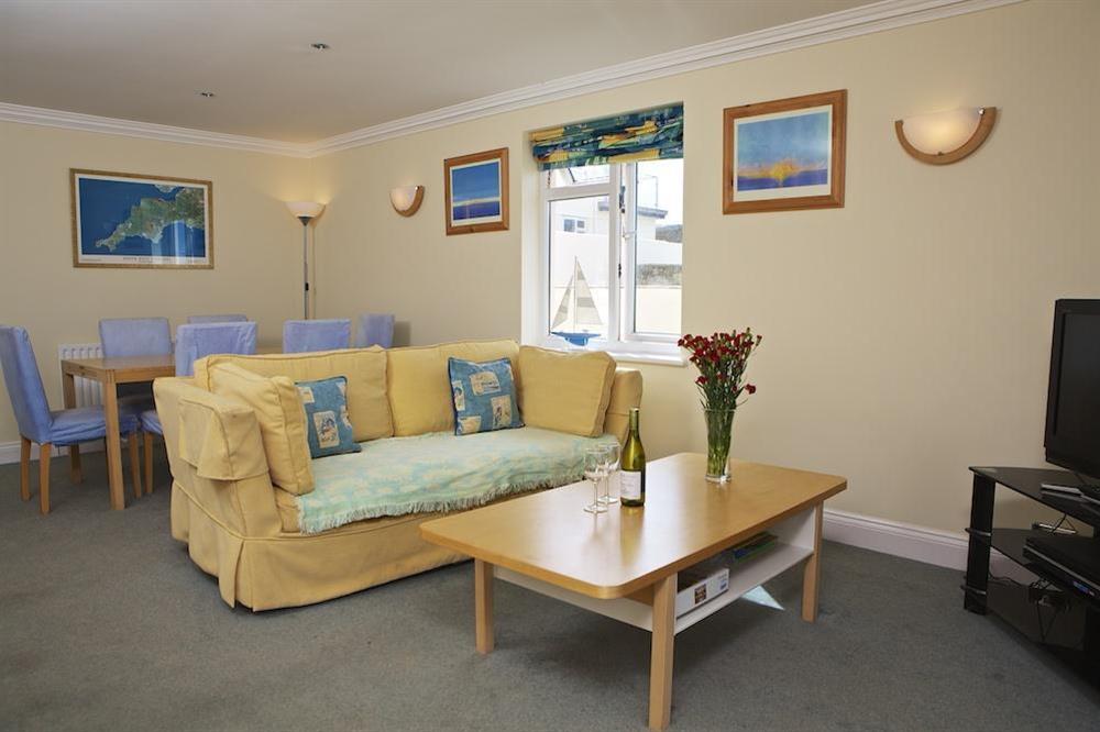 A large comfortable living and dining room at 1 Thurlestone Rock Apartments in Thurlestone, Kingsbridge