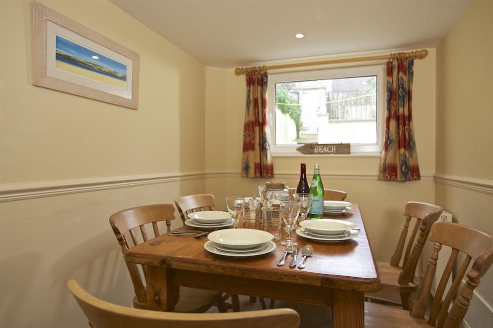 Dining area with seating for six at 1 Top View Cottages in Bonaventure Road, Salcombe