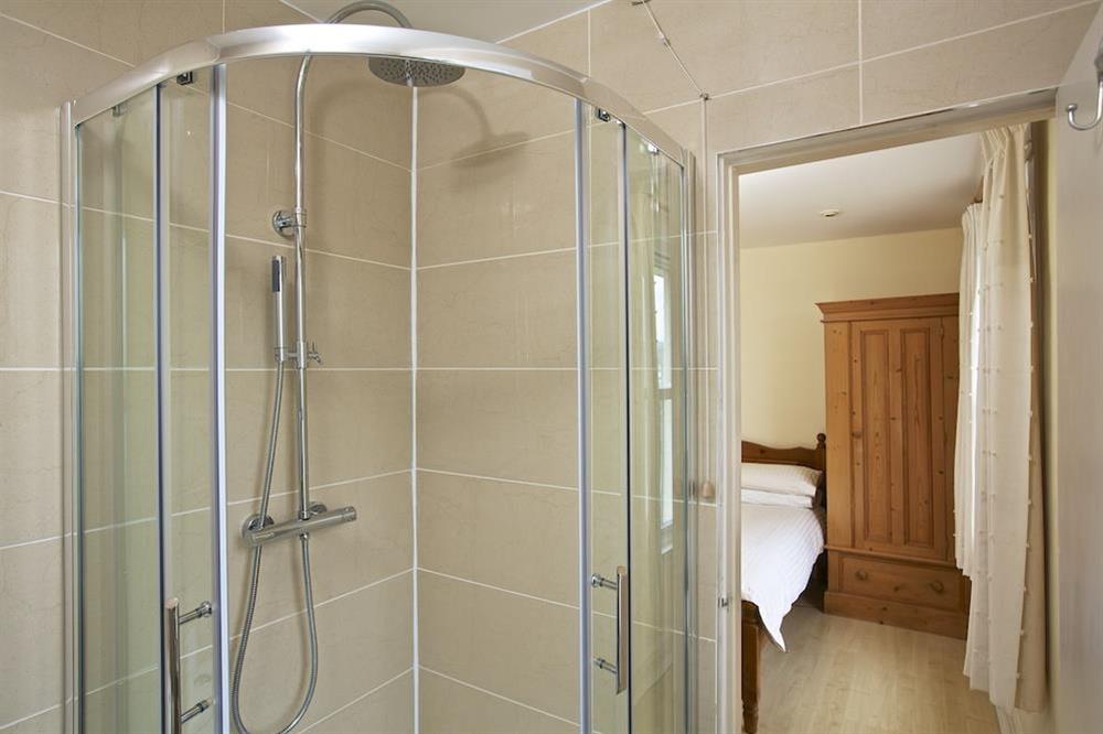 Overhead rain shower with separate handheld shower head at 1 Top View Cottages in Bonaventure Road, Salcombe