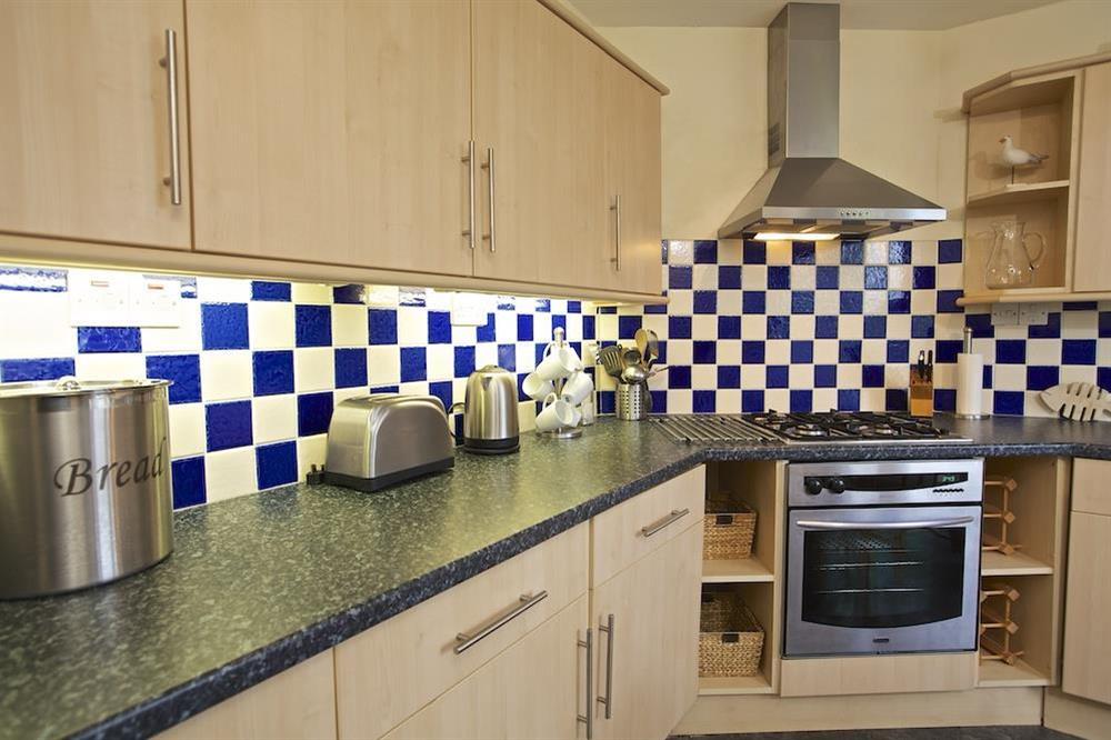 Well equipped kitchen with modern appliances at 1 Top View Cottages in Bonaventure Road, Salcombe