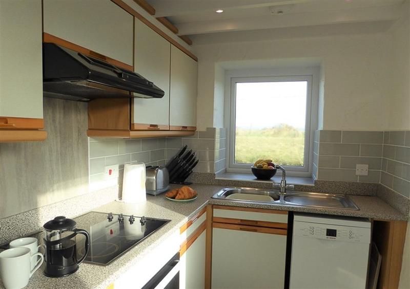 This is the kitchen at 1 Tyn Don, Abersoch