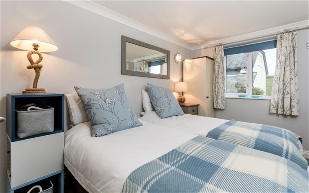 Bedroom 2 with twin beds at 1 West Park Mews in Hope Cove