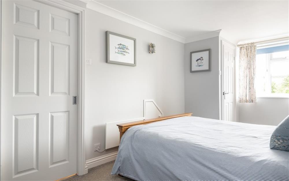 One of the bedrooms at 1 West Park Mews in Hope Cove