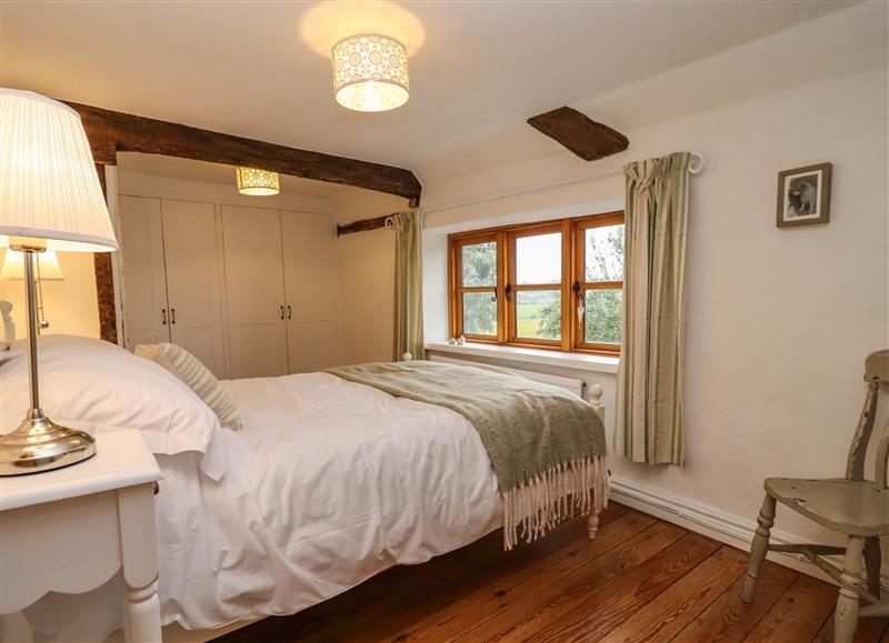 A bedroom in 1 White House Cottages (photo 3) at 1 White House Cottages, Bromsash near Lea