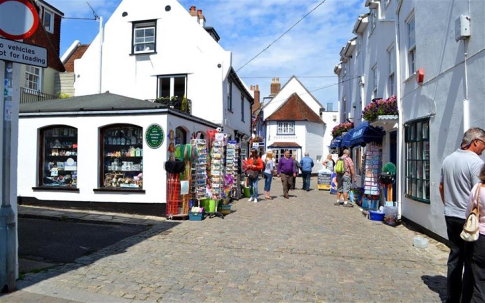 Shops along the cobbled street leading away from the harbour