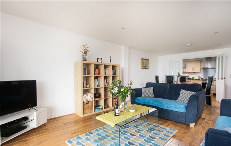 Relax in the living area at 10 Bredon Court, Cornwall