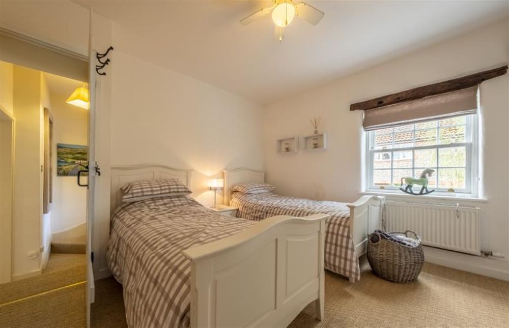 Bedroom two with full-size twin beds at 10 Burnham Road, North Creake near Fakenham