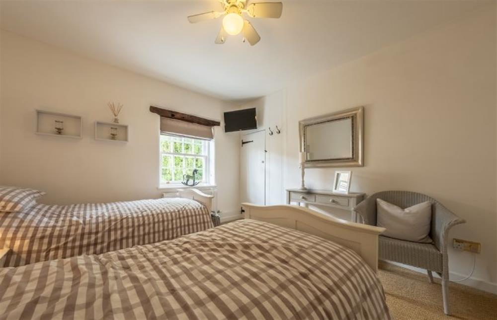 Bedroom two with wall-mounted television at 10 Burnham Road, North Creake near Fakenham