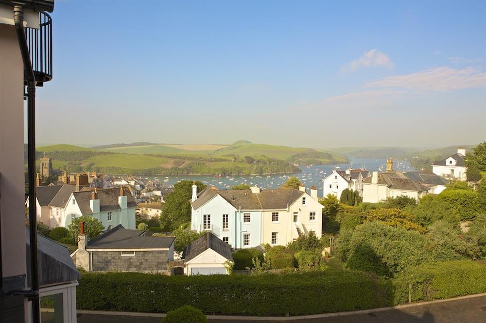 View from the balcony over the rooftops towards the estuary at 10 Combehaven in , Salcombe
