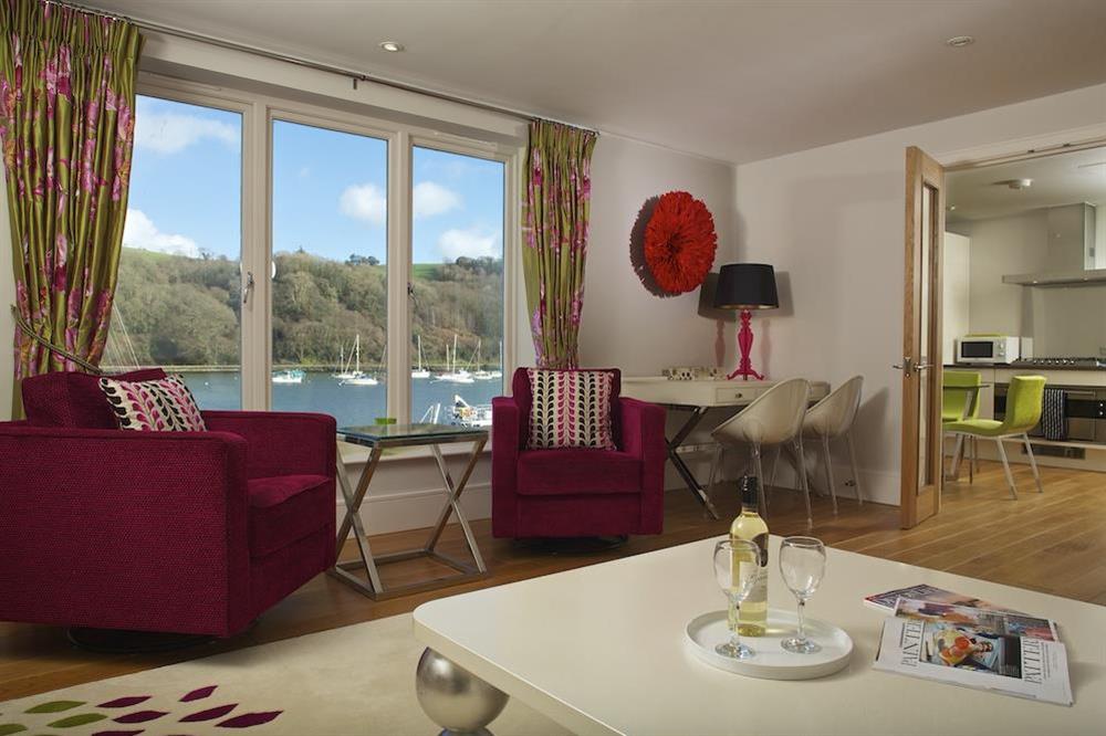Take in the view from the picture window in the spacious lounge at 10 Dart Marina in , Dart Marina