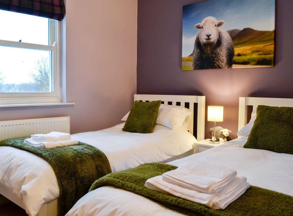 Twin bedroom at 10 Elm Court in Keswick, Cumbria