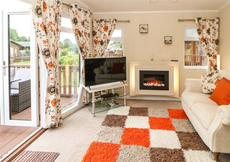 Relax in the living area at 10 Poppy Lodge, Tunstall near Hipswell