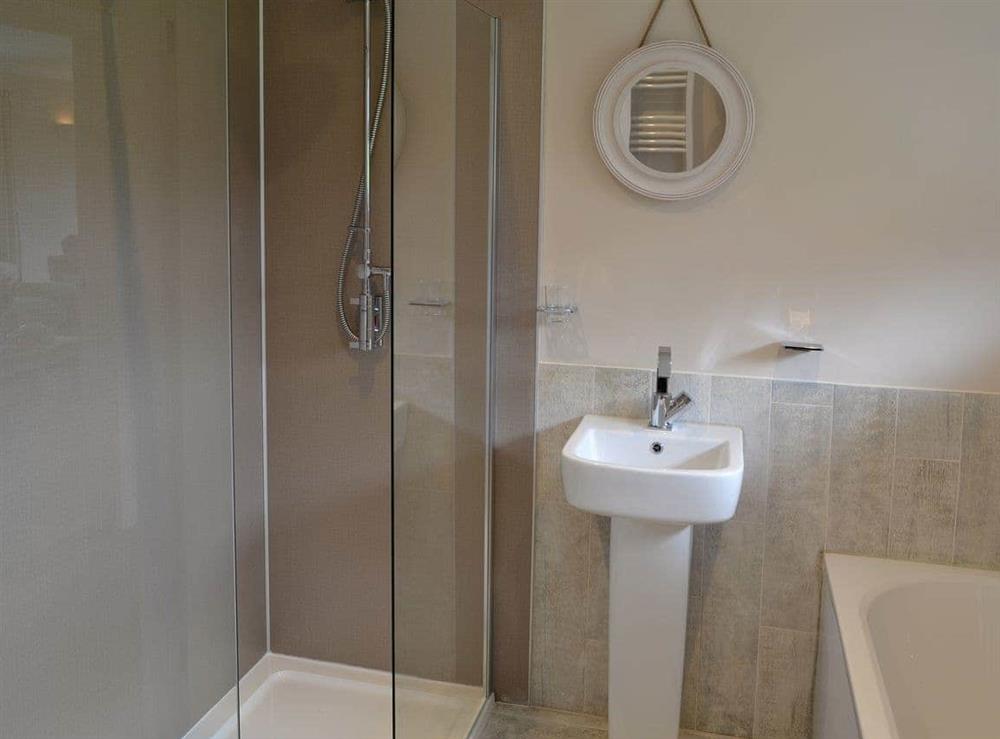 Bathroom with walk in shower (photo 2) at 10 Silvershell View in Port Isaac, Cornwall