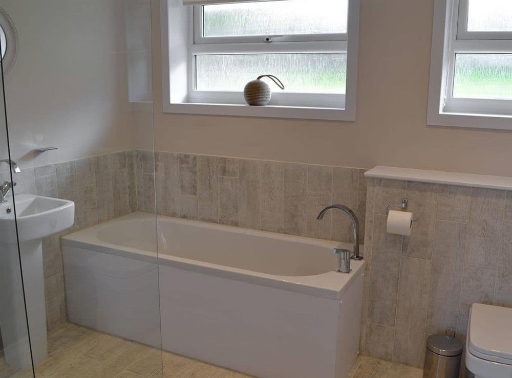 Bathroom with walk in shower at 10 Silvershell View in Port Isaac, Cornwall