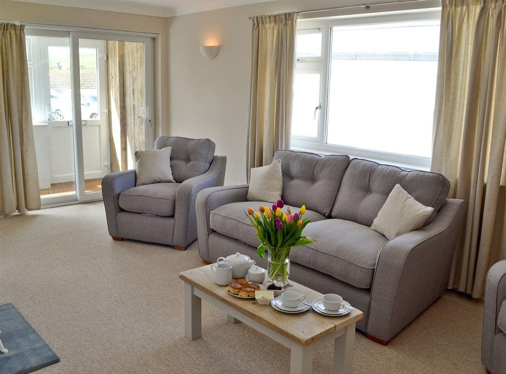 Light and airy living room (photo 2) at 10 Silvershell View in Port Isaac, Cornwall