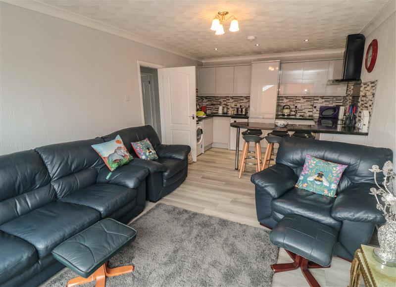 The living area at 10 Southcliffe Drive, Primrose Valley