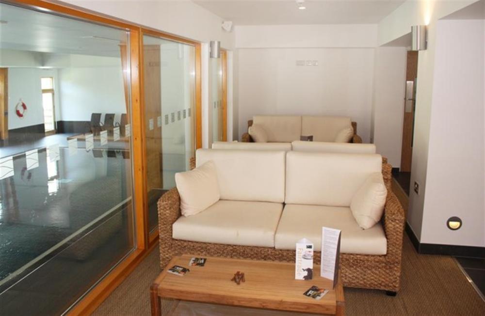 Seating in the reception area by the indoor pool at 10 Talland in Talland Bay