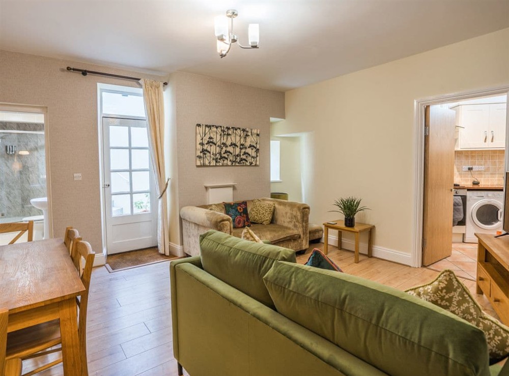 Living room/dining room at 10 Trinity Mews in Torquay, Devon