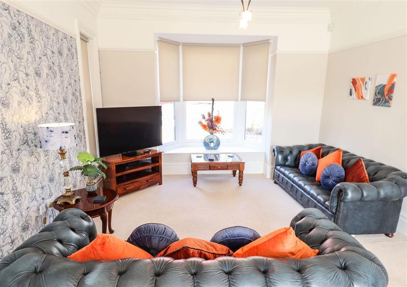 Relax in the living area at 105 Spilsby Road, Boston