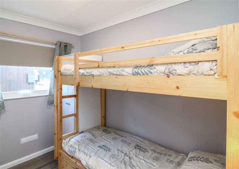 One of the bedrooms at 106 Cherry Park, Chapel St Leonards