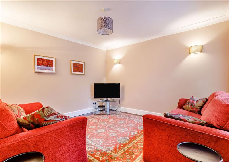 Enjoy the living room at 11 Beech Road, Weymouth