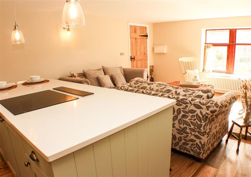 Relax in the living area at 11 Lane End, Thornton