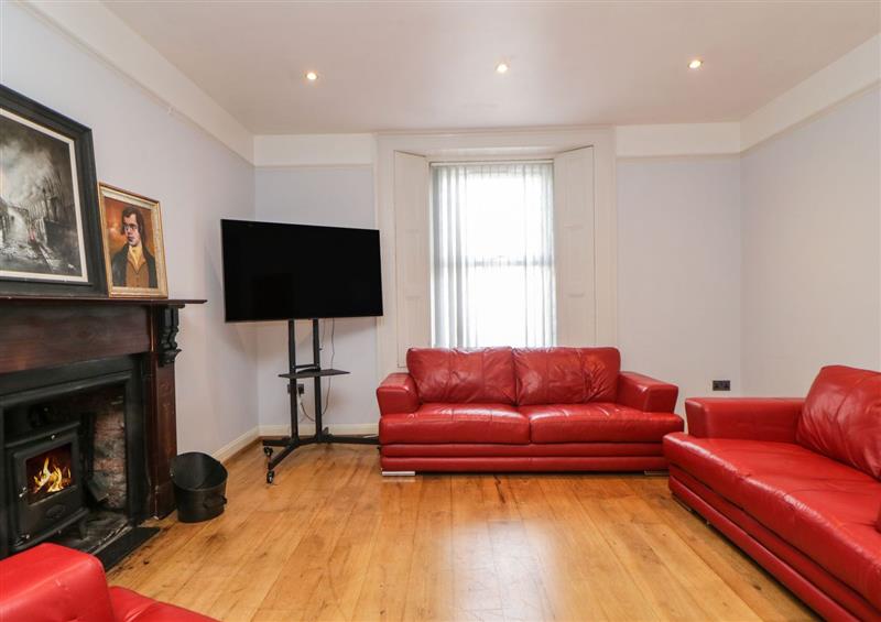 Relax in the living area at 11 Magdalene Road, Torquay