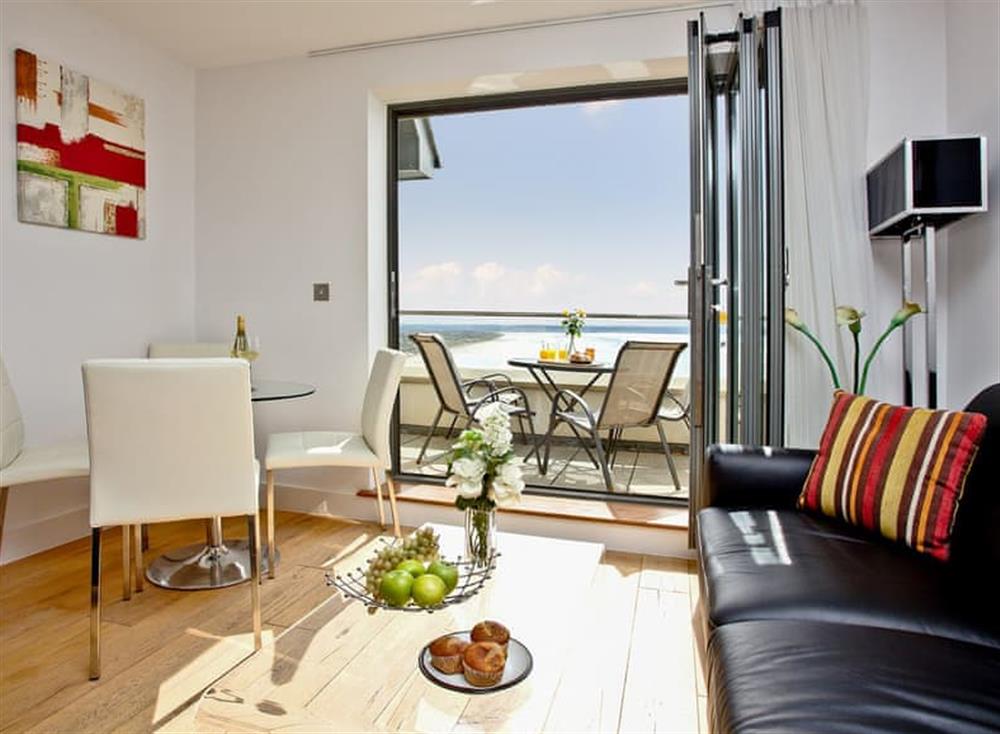 Lovely open living space with beach views at 11 Ocean Point Penthouse in , Saunton & Braunton