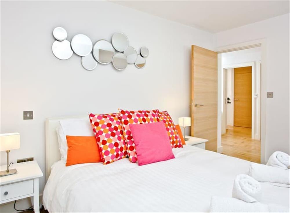 Relaxing and calming bedroom with double bed at 11 Ocean Point Penthouse in , Saunton & Braunton