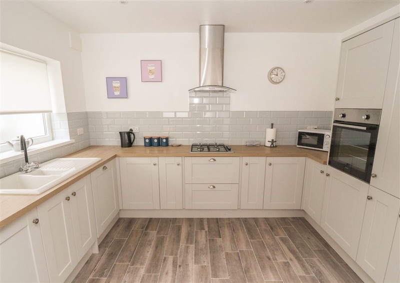 This is the kitchen at 11 Seabreeze, Llandudno