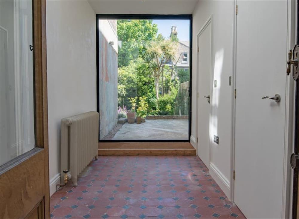 Hallway with garden window at 12 Arthur Road in Cliftonville, England