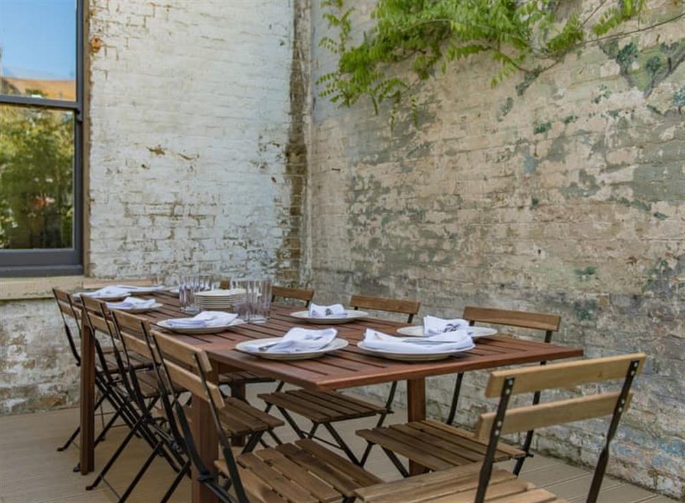 Outdoor eating area at 12 Arthur Road in Cliftonville, England
