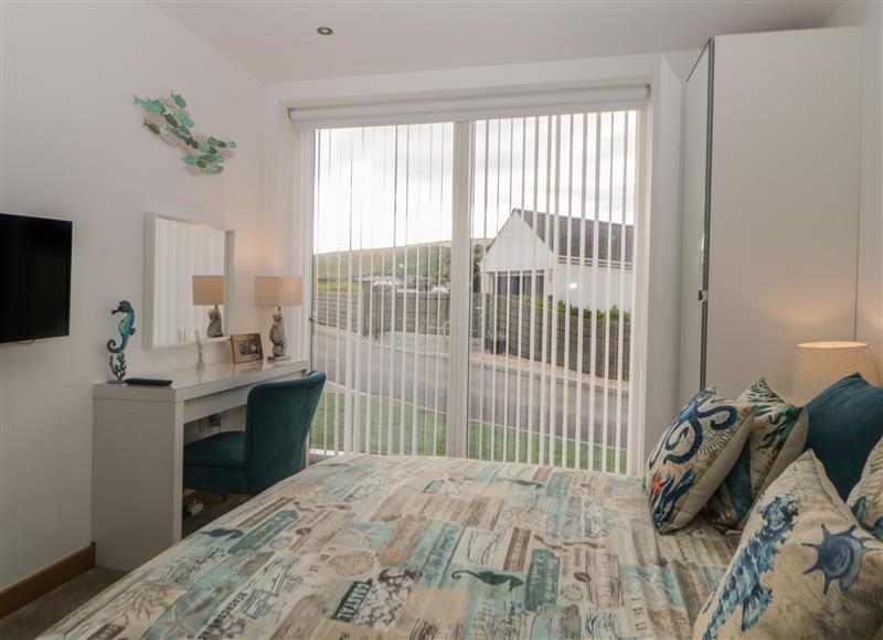 This is a bedroom (photo 2) at 12 Beachdown, Challaborough