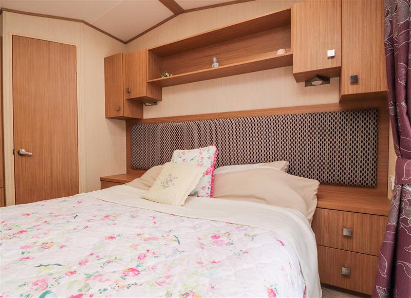 This is a bedroom at 12 Broughton Park - Sanctuary, Ocean Edge Holiday Park in Heysham