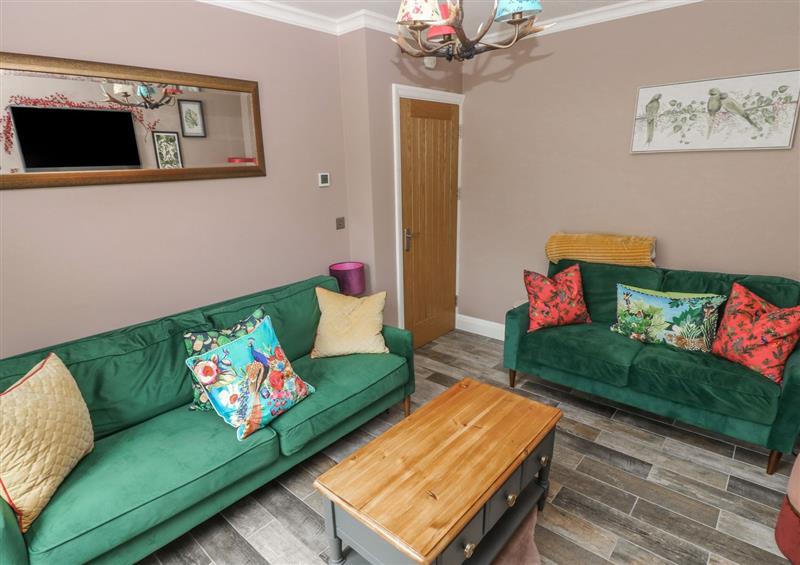 Relax in the living area (photo 3) at 12 Malthall, Llanrhidian