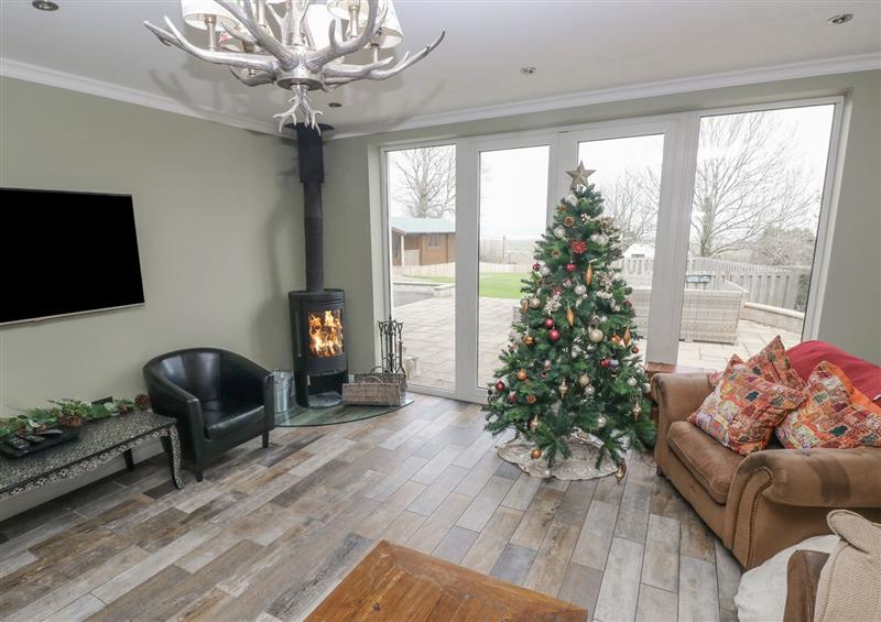 Relax in the living area at 12 Malthall, Llanrhidian