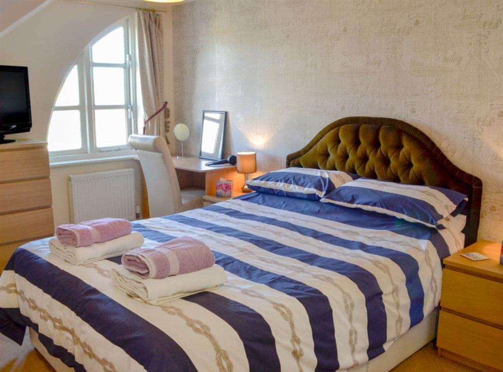 Comfortable double bedroom at 12 Maritime House in Bridport, Dorset