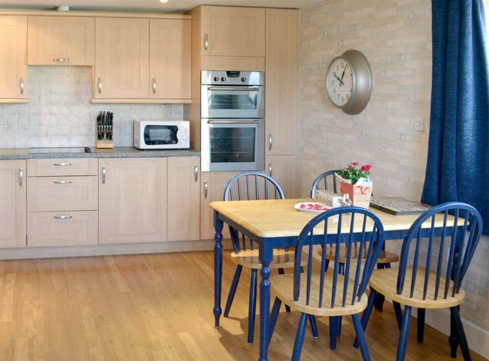 Spacious kitchen/ dining area at 12 Maritime House in Bridport, Dorset