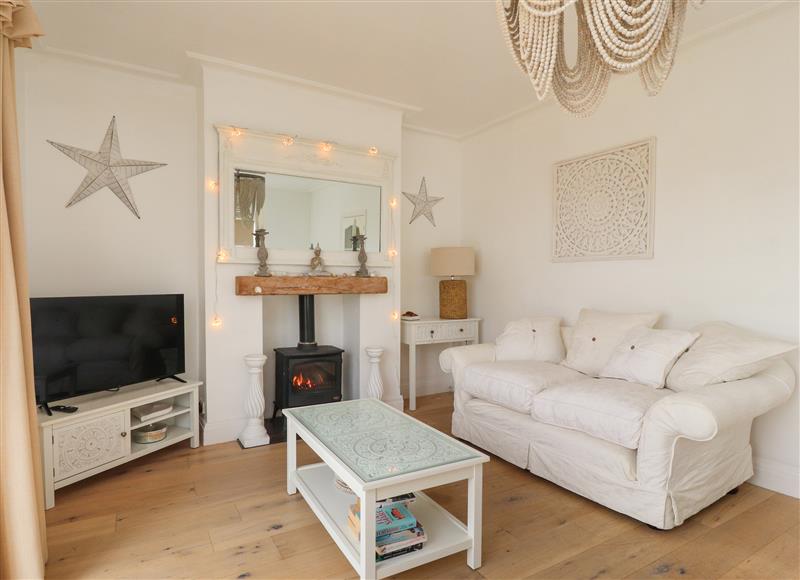 Relax in the living area at 12 Pennystone Road, Blackpool