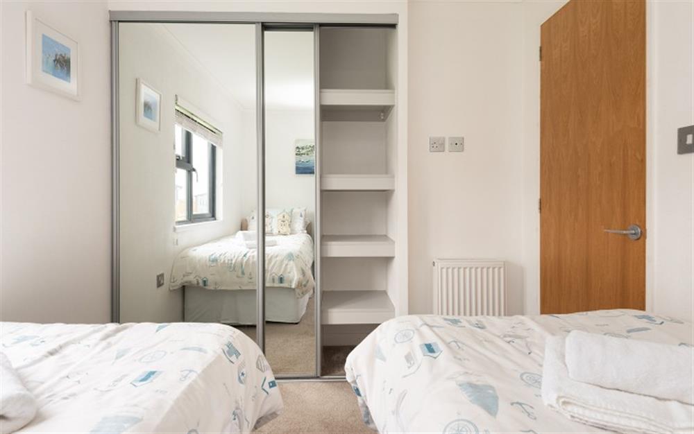 The twin room showing large wardrobe. at 12 Salcombe Retreat in Salcombe