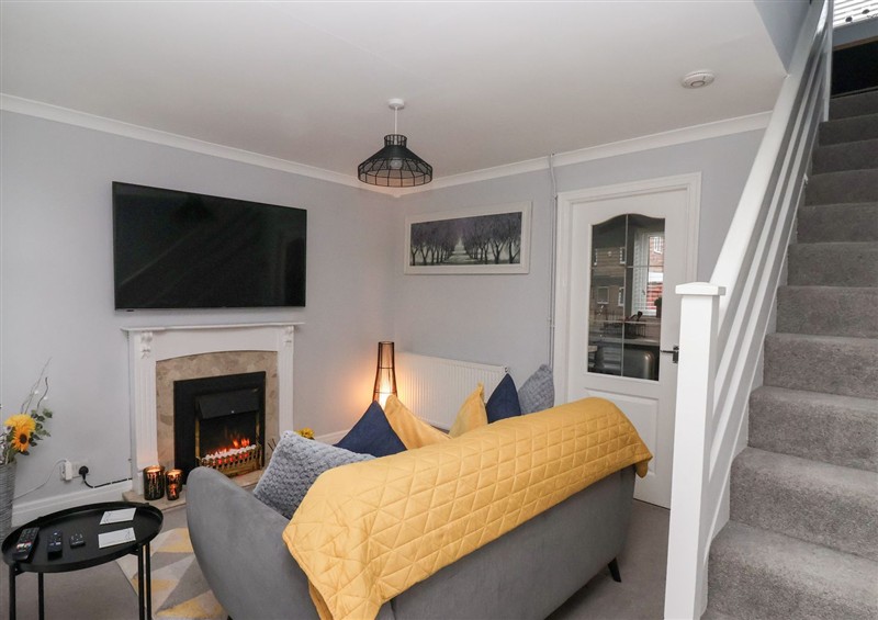 Relax in the living area at 127 Bellhouse Way, York