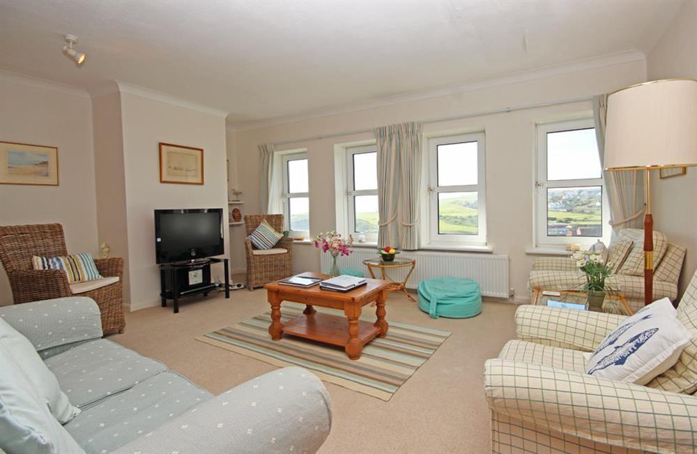 Lounge with superb views over golf course, beach and out to sea at 13 Links Court in Thurlestone, Kingsbridge