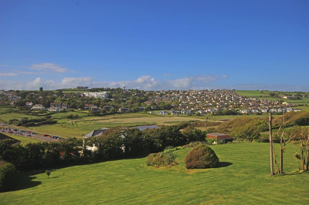 View from lounge over golf course and village at 13 Links Court in Thurlestone, Kingsbridge