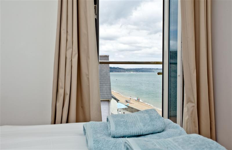 One of the bedrooms at 14 At The Beach, Devon