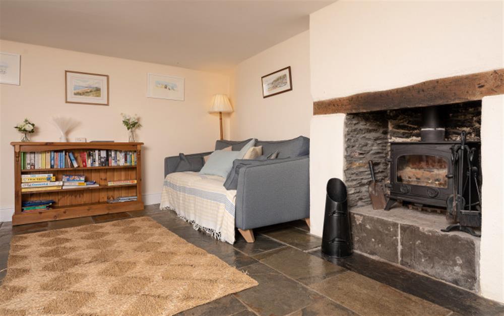 Lovely spacious sitting room with log burner