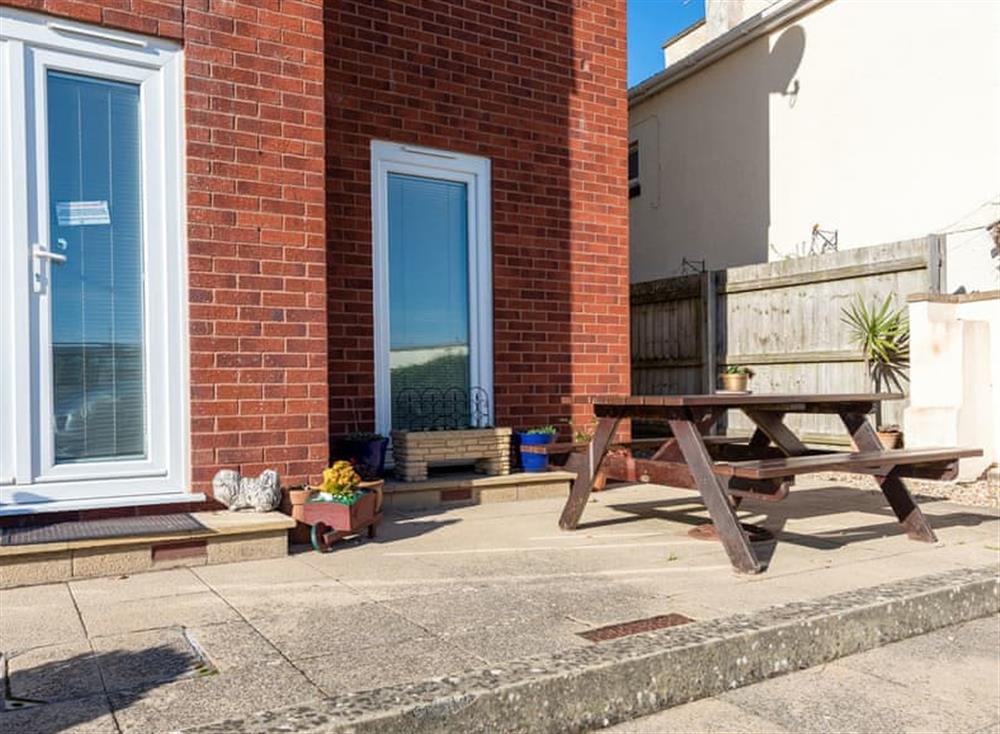 Patio area with picnic bench at 14 Belvedere Court in , Paignton