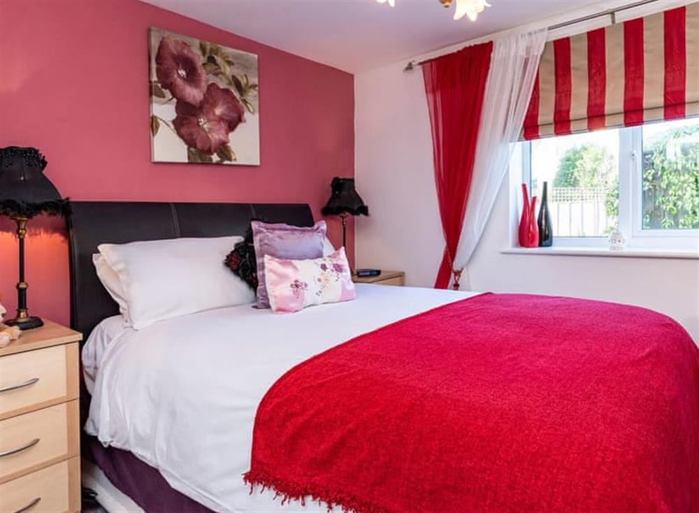 Serene bedroom with kingsize bed at 14 Belvedere Court in , Paignton
