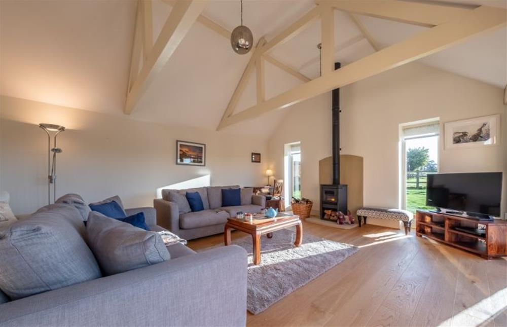 Ground floor: A light and airy sitting room  at 14 Burnham Road, Ringstead near Hunstanton
